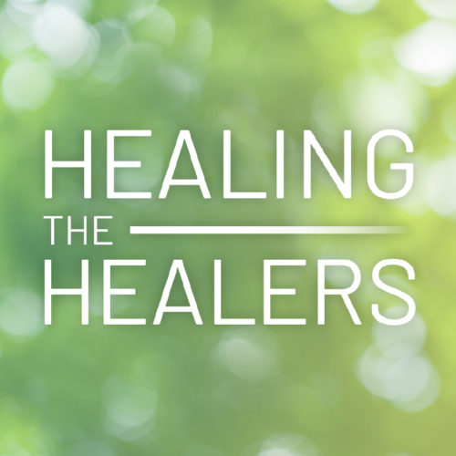 the healing the healers logo features all-caps thin white text on a green bokeh background.