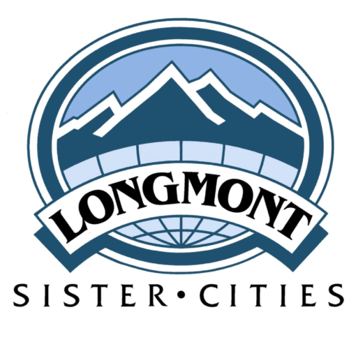 The Longmont Sister Cities logo features a white banner stretched across a blue circle filled with vector mountains.